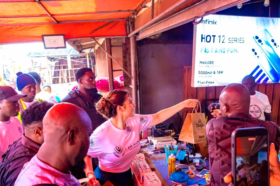 Foundation volunteers meeting traders at a market stall