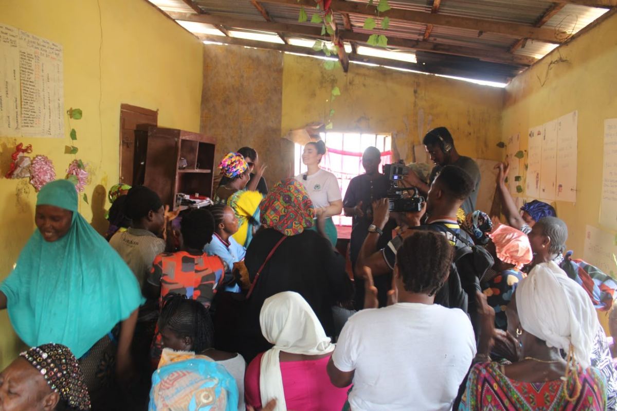 A crowded room of women at a community gathering